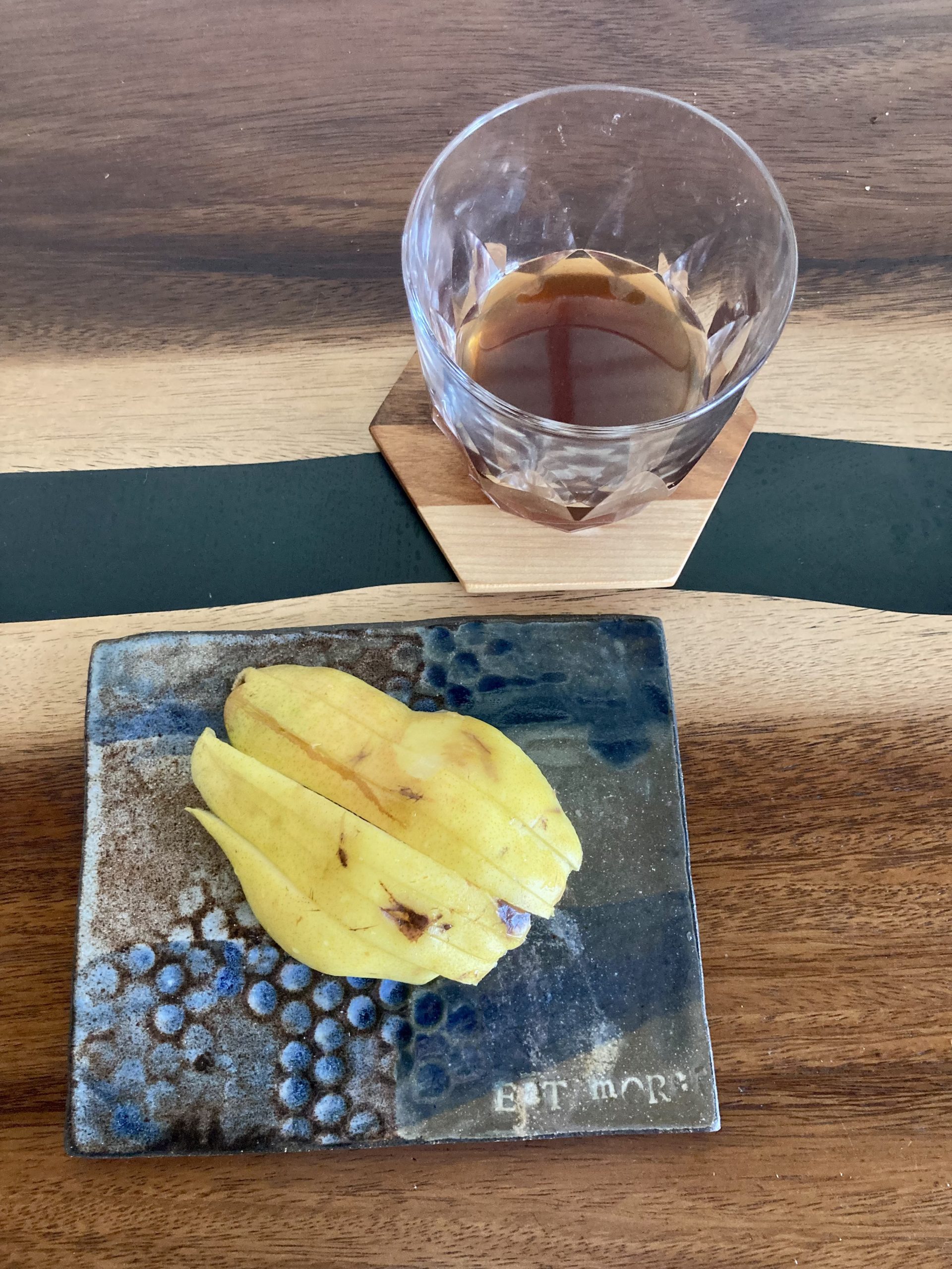 yellow slices of pear on a ceramic rectangle